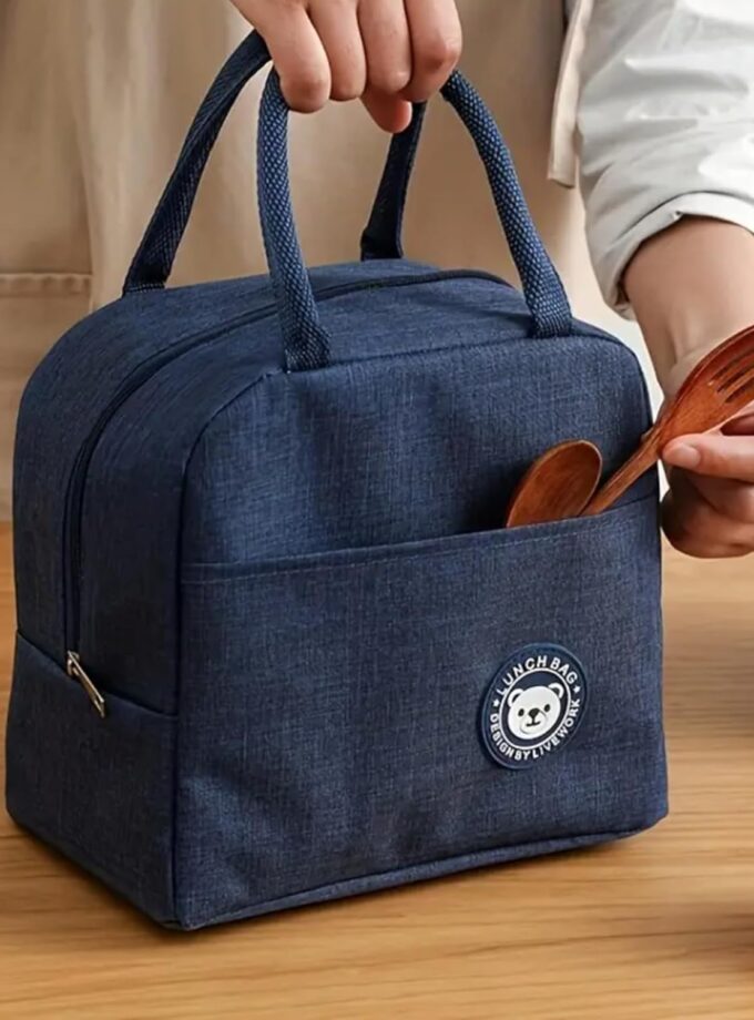 About this item EASY TO CARRY : Comes with sturdy dual handles for comfortable grip and effortless portability wherever you go. DURABLE & WATERPROOF : Made from premium waterproof fabric with reinforced stitching for long-lasting use and easy cleaning. SPACIOUS YET COMPACT : Offers generous space to fit lunch boxes, snacks, and drinks while maintaining a sleek, compact design that fits in your backpack or car seat. INSULATED FOR FRESHNESS : Designed with high-quality thermal insulation to keep your food hot or cold for hours, making it perfect for work, school, or outdoor activities. EXTRA FRONT POCKET : Features a convenient front pocket for storing cutlery, napkins, or small essentials for easy access on the go.